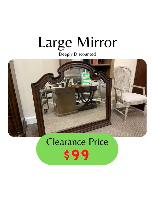 large mahogony finished framed beveled mirror with scalloped top